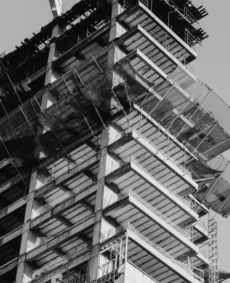 High-rise building under construction with structural steel framework