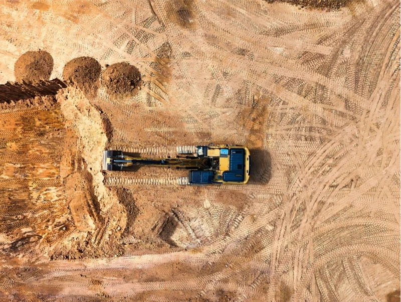 Aerial view of an excavator on a construction site